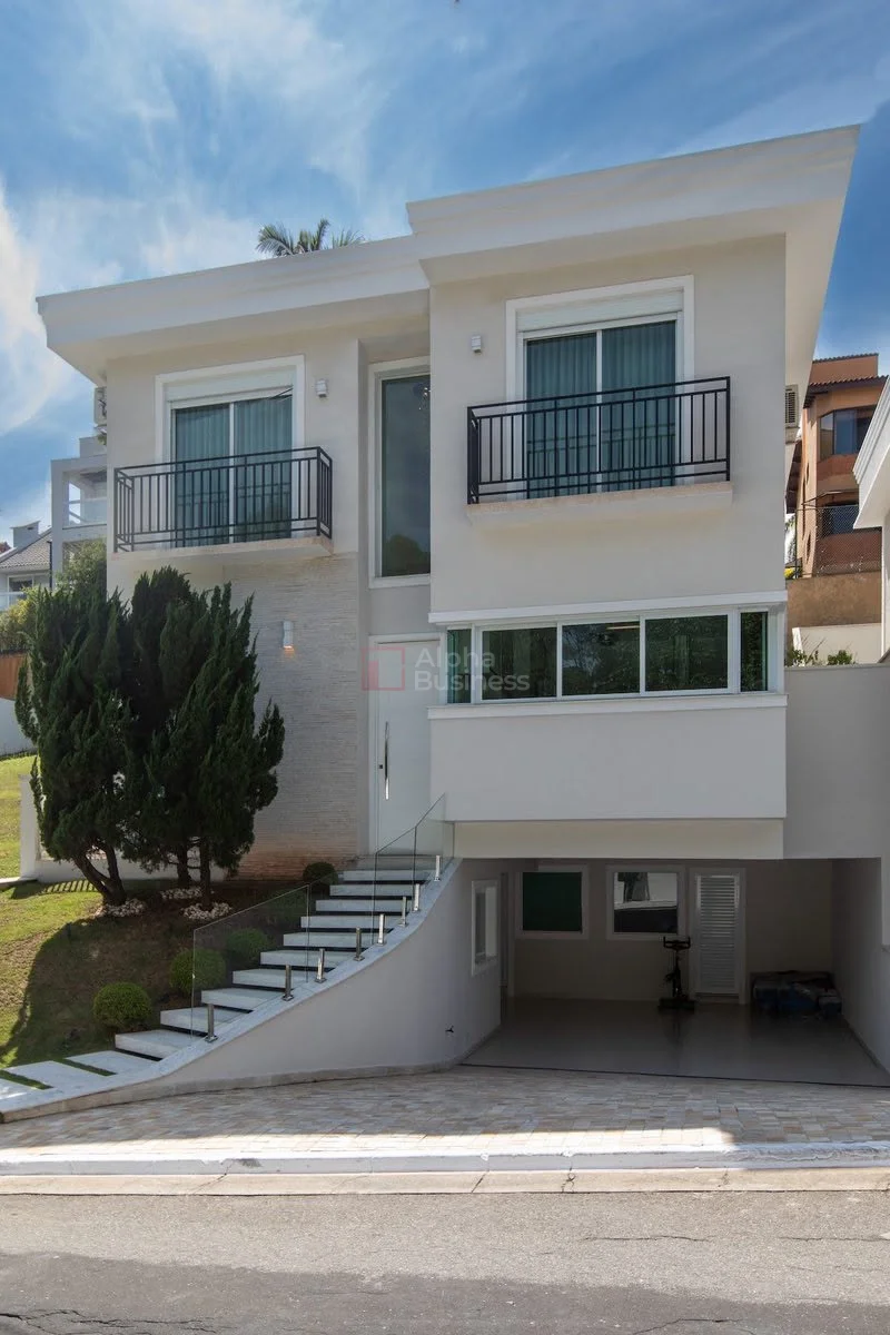 Fachada principal ou destaque de Casa à Venda Mobiliada Alphaville 3 | 4 Suítes | CA0922 - Alphaville 3